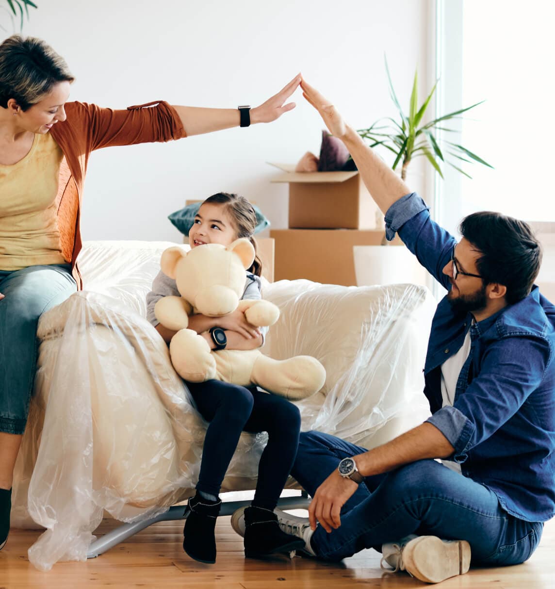 Housenova team members standing in front of a modern building.